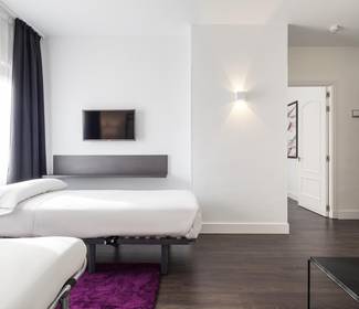 Chambre pour 4 personnes Hotel ILUNION Suites Madrid