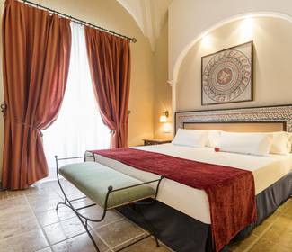Chambre junior suite Hotel ILUNION Mérida Palace