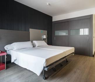 Chambre accessible Hotel ILUNION Suites Madrid Chambre accessible Hotel ILUNION Suites Madrid